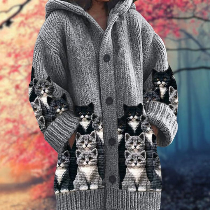 Annelie™ | Warmer women's sweater with buttons and hood.