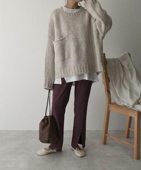 Oversized beige sweater with front pockets